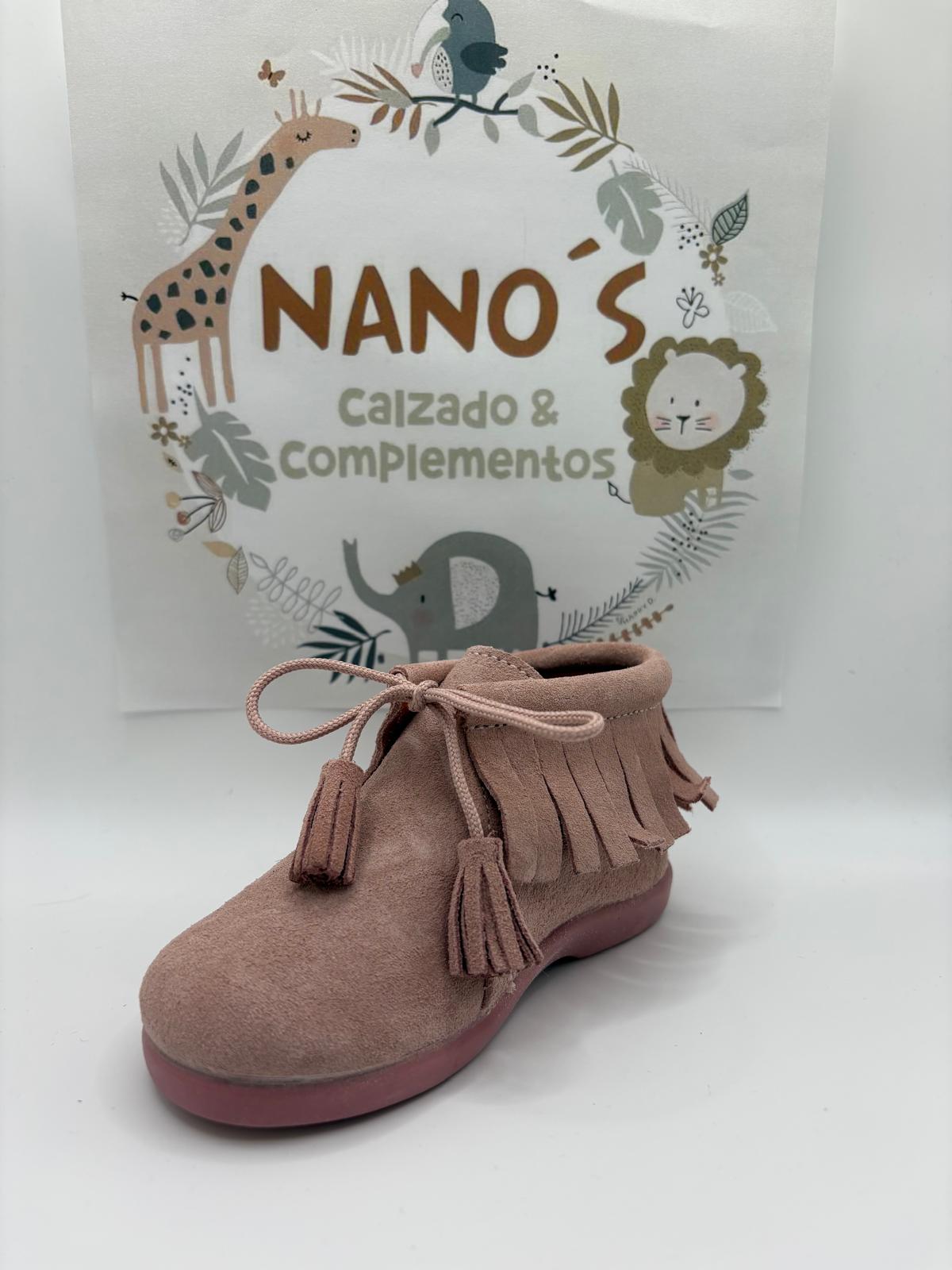 Bota flecos.